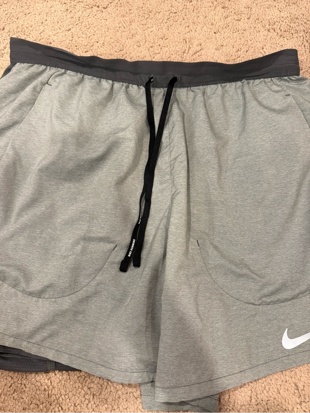 Nike Women’s Light Gray Athletic Shorts with Black Drawstring